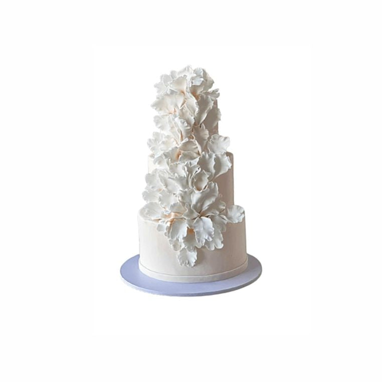 Three-Tier White Wedding Cake with Intricate Floral Art – Elegant Engagement Cake | Abu Dhabi & UAE Delivery in Abu Dhabi | Wedding / Engagement Cakes Delivery UAE – Legrandeuae
