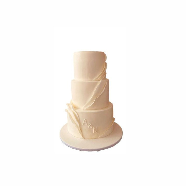 Three-Tier White Wedding Cake with Intricate Side Art – Elegant Engagement Cake | Abu Dhabi & UAE Delivery in Abu Dhabi | Wedding / Engagement Cakes Delivery UAE – Legrandeuae