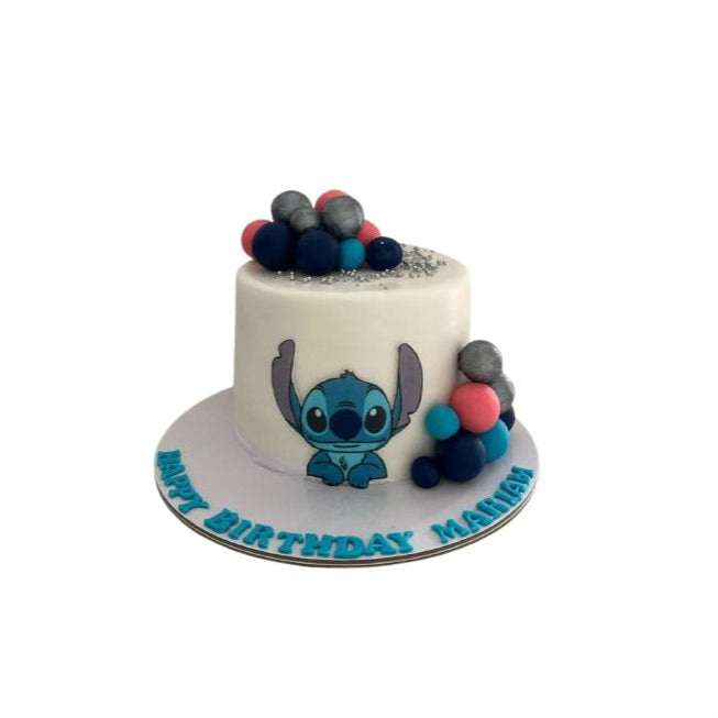 Custom Stitch White Cake with Spherical Toppers - Abu Dhabi in Abu Dhabi | Stitch cakes Delivery UAE – Legrandeuae