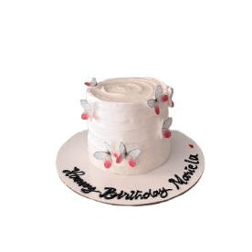 Elegant white birthday cake decorated with pink flowers - Abu Dhabi
