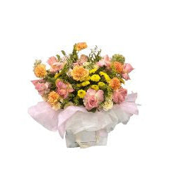 Pink and Yellow Rose Flower Bouquet with Orange Carnations in Elegant White Wrapping - Abu Dhabi in Abu Dhabi | Birthday Flowers / Bouquet (All Genders) Delivery UAE – Legrandeuae