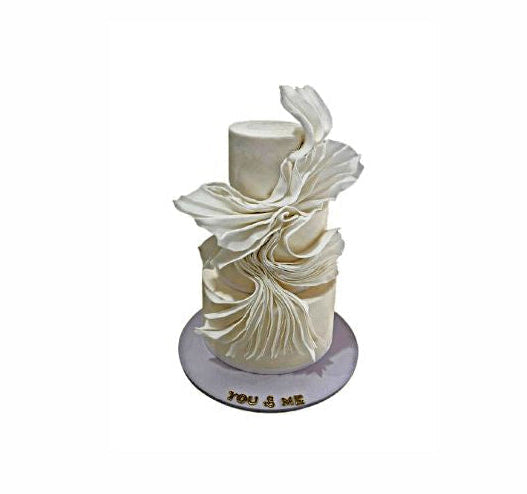 Three-tired Modern White Color Wedding Cake in Flowing Fabric Design - Abu Dhabi in Abu Dhabi | Wedding / Engagement Cakes Delivery UAE – Legrandeuae