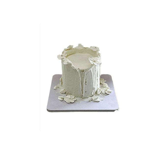 White Color Melting Candle Design Wedding Cake - Abu Dhabi in Abu Dhabi | Wedding / Engagement Cakes Delivery UAE – Legrandeuae