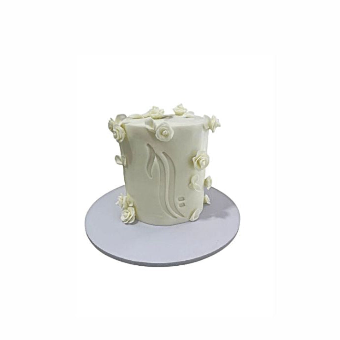White Color Wedding Cake with Arabic Calligraphy and Adorned with White Roses - Abu Dhabi in Abu Dhabi | Wedding / Engagement Cakes Delivery UAE – Legrandeuae