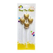 شمعة ذهبية على شكل قلب