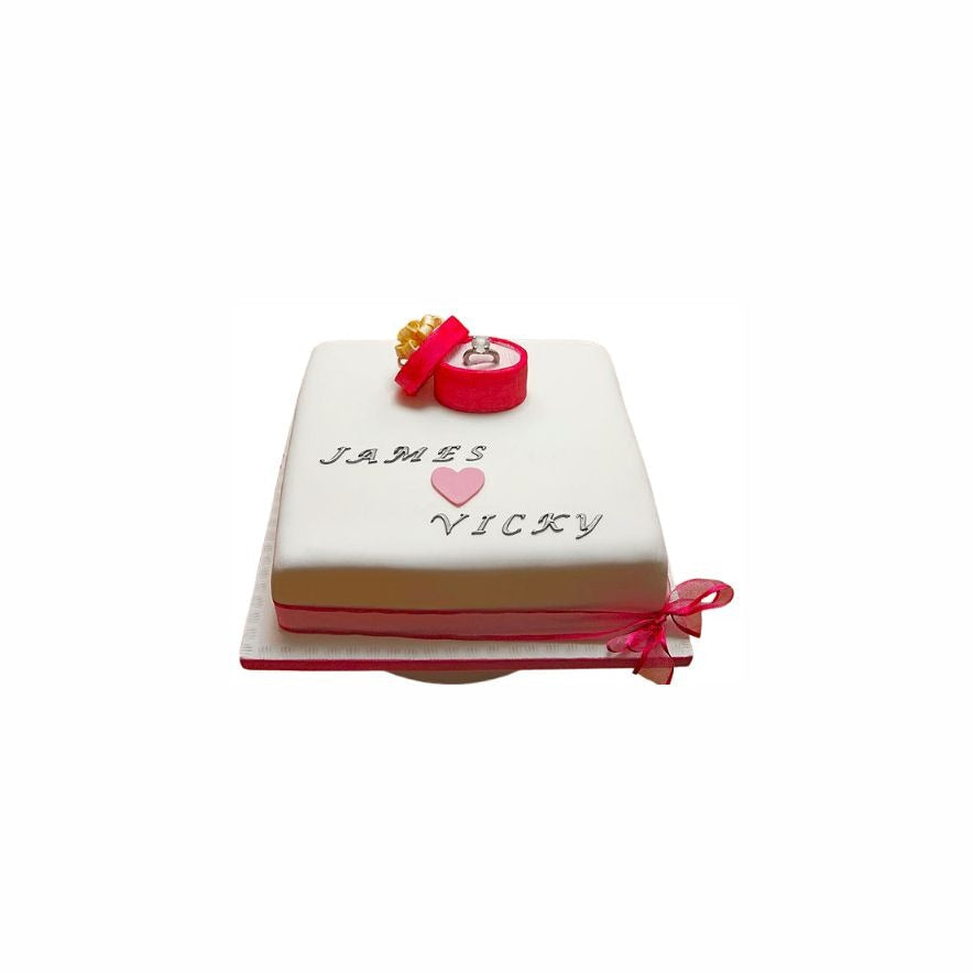 Romantic White Square Engagement Cake with Ring in Red Box – Elegant Wedding Cake | Abu Dhabi & UAE Delivery in Abu Dhabi | Wedding / Engagement Cakes Delivery UAE – Legrandeuae