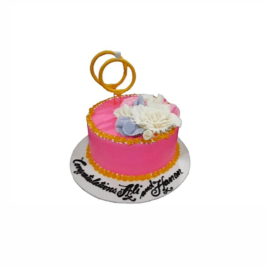 Bright Pink & White Engagement Cake with Floral Décor & Ring Topper – Elegant Wedding Cake | Abu Dhabi & UAE Delivery in Abu Dhabi | Wedding / Engagement Cakes Delivery UAE – Legrandeuae