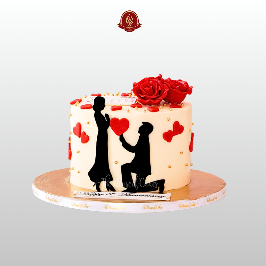 White Anniversary Cake with Couple Acrylic Topper | Abu Dhabi & UAE Delivery in Abu Dhabi | Annivesary Cakes Delivery UAE – Legrandeuae