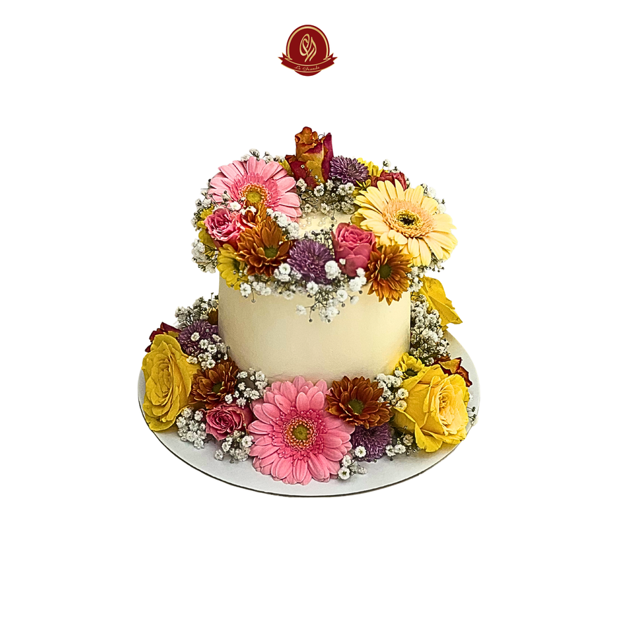 White Color Birthday Cake Decorated with Colourful Flowers | Abu Dhabi & UAE Delivery in Abu Dhabi | Birthday Cakes – Adults Delivery UAE – Legrandeuae