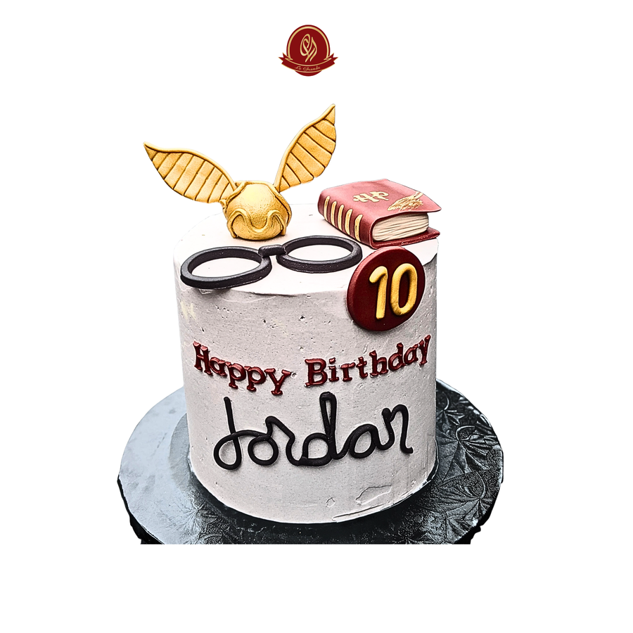 Harry potter Golden Snitch & Spell Book Cake- Abu Dhabi in Abu Dhabi | Harry Potter cakes Delivery UAE – Legrandeuae