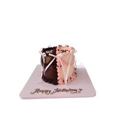 Elegant Pink & Brown Chocolate Birthday Cake with Floral Decorations - Abu Dhabi in Abu Dhabi | Birthday cakes - Children Delivery UAE – Legrandeuae