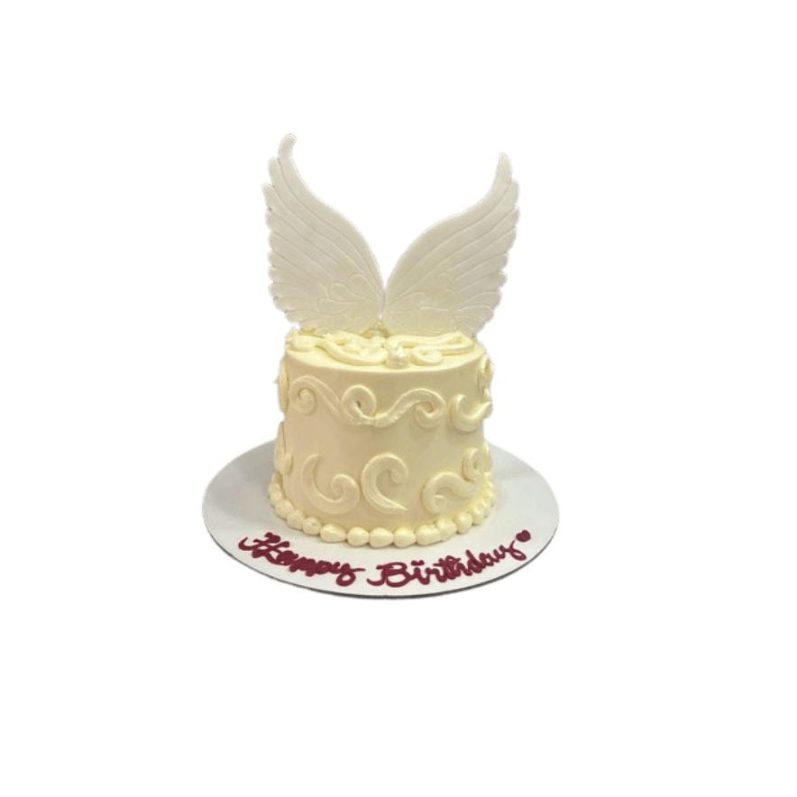 Elegant White Angel Wings Birthday Cake with Sugar Swirls- Abu Dhabi