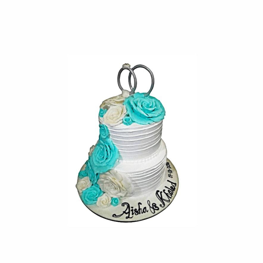 Two-Tier Wedding Cake with Floral Arrangements – Elegant Engagement Cake | Abu Dhabi & UAE Delivery in Abu Dhabi | Wedding / Engagement Cakes Delivery UAE – Legrandeuae