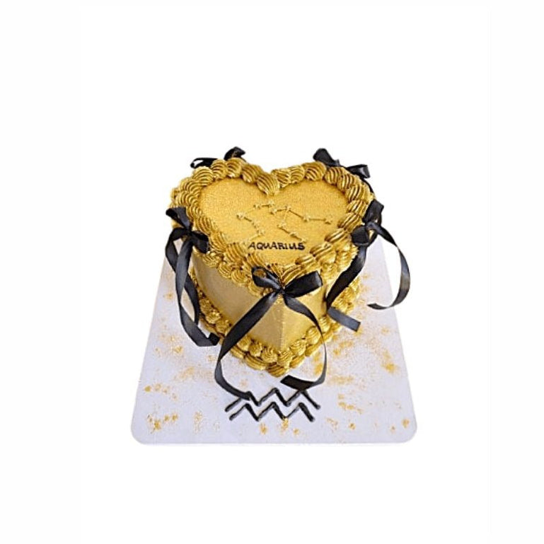 Golden Heart Shape Cake with Ribbon – Luxury Romantic Birthday Cake | Abu Dhabi & UAE Delivery in Abu Dhabi | Birthday Cakes – Adults Delivery UAE – Legrandeuae