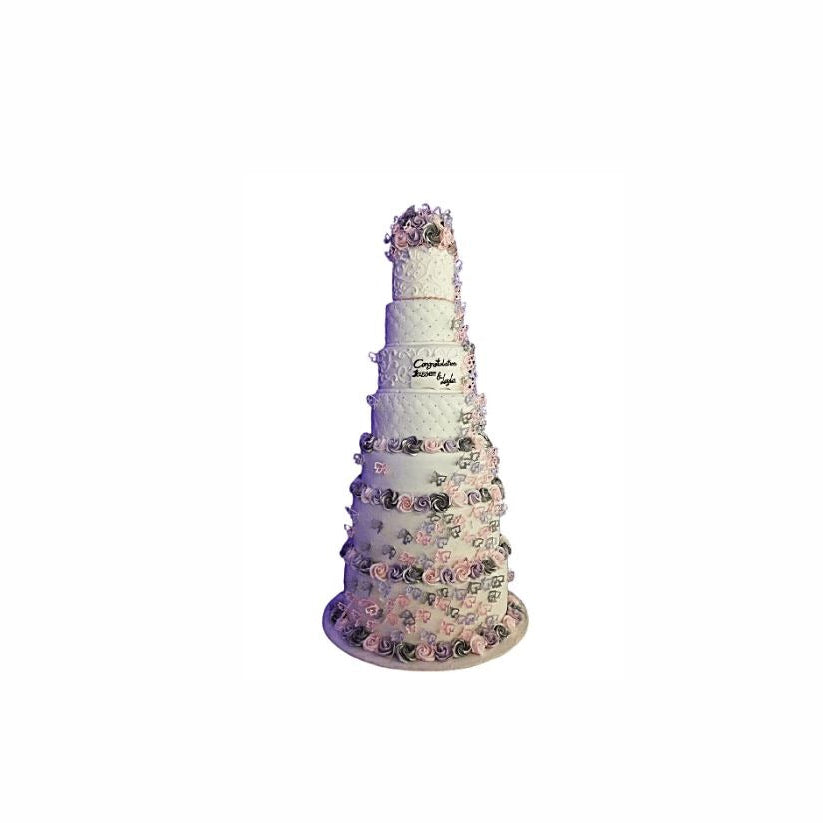 Seven-Layer White Wedding Cake with Pink Bloom Flowers – Luxury Tower Cake | Abu Dhabi & UAE Delivery in Abu Dhabi | Wedding / Engagement Cakes Delivery UAE – Legrandeuae