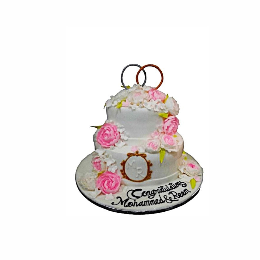 Two-Layer White Engagement Cake with Floral & Ring Theme – Elegant Wedding Cake | Abu Dhabi & UAE Delivery in Abu Dhabi | Wedding / Engagement Cakes Delivery UAE – Legrandeuae