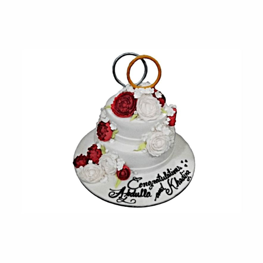 Two-Layer White Wedding Cake with Red & White Roses and Ring Topper – Elegant Engagement Cake | Abu Dhabi & UAE Delivery in Abu Dhabi | Wedding / Engagement Cakes Delivery UAE – Legrandeuae